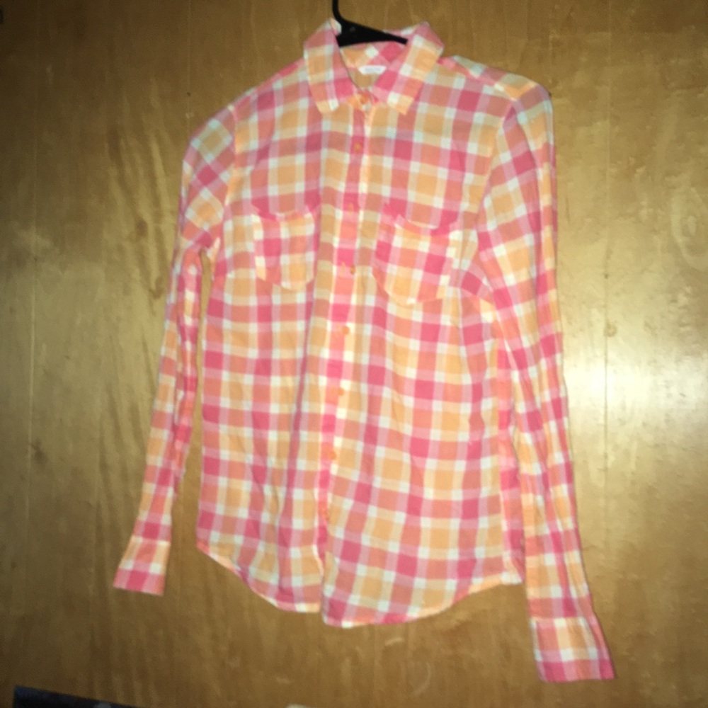 Button down plaid woman’s shirt